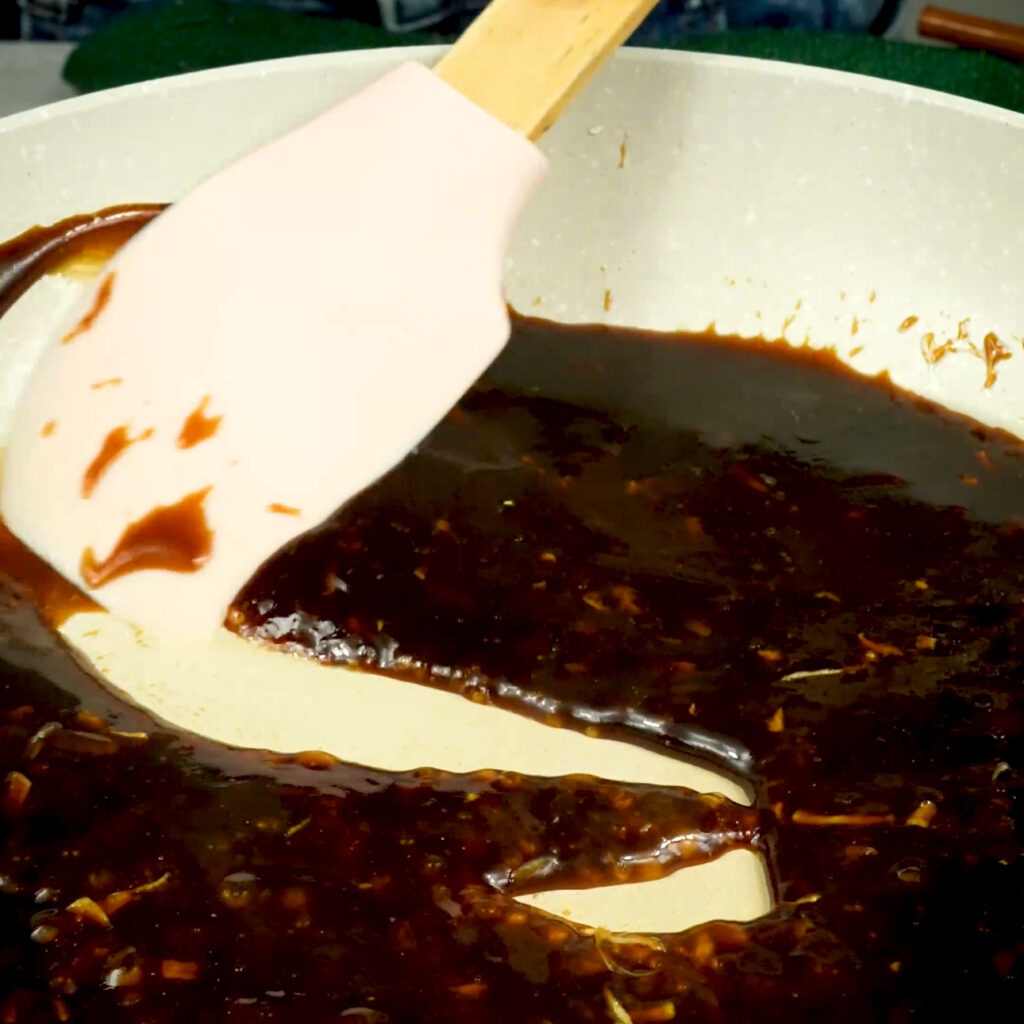 Cooking sauce in a frying pan.