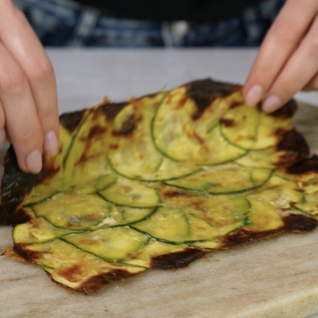 Baked courgette slices.