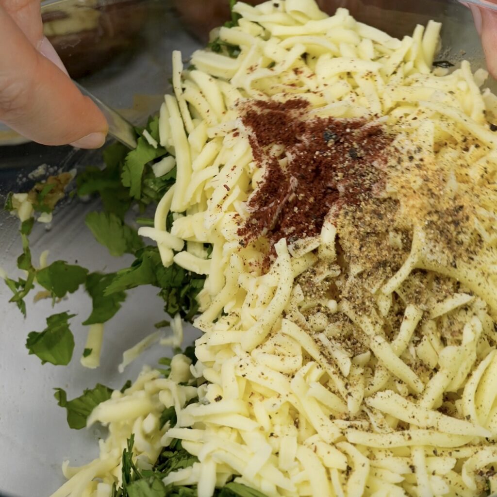 Mixing the filling for aubergines 