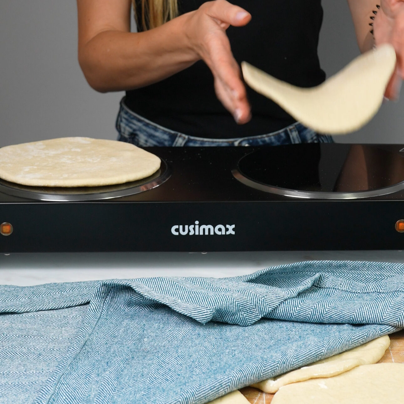 Pita bread cooking on a Cusimax hot plate.