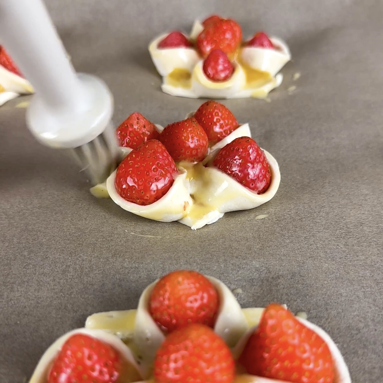 Puff pastry brushed with egg wash.