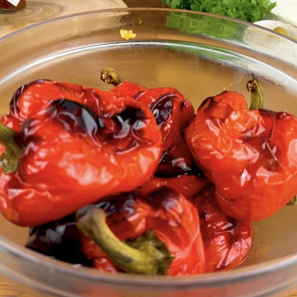 Roasted red bell peppers in a bowl 