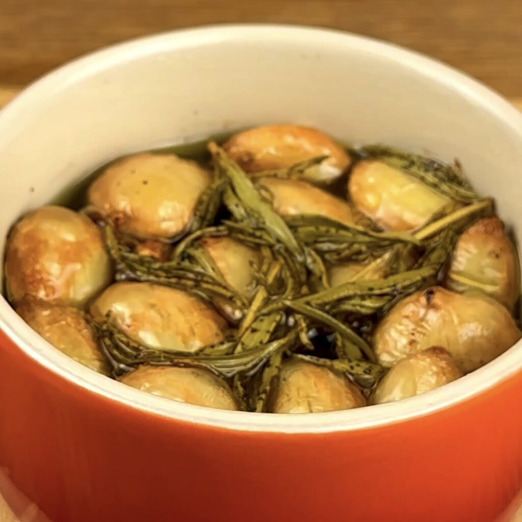 Soft, golden-brown roasted garlic cloves.