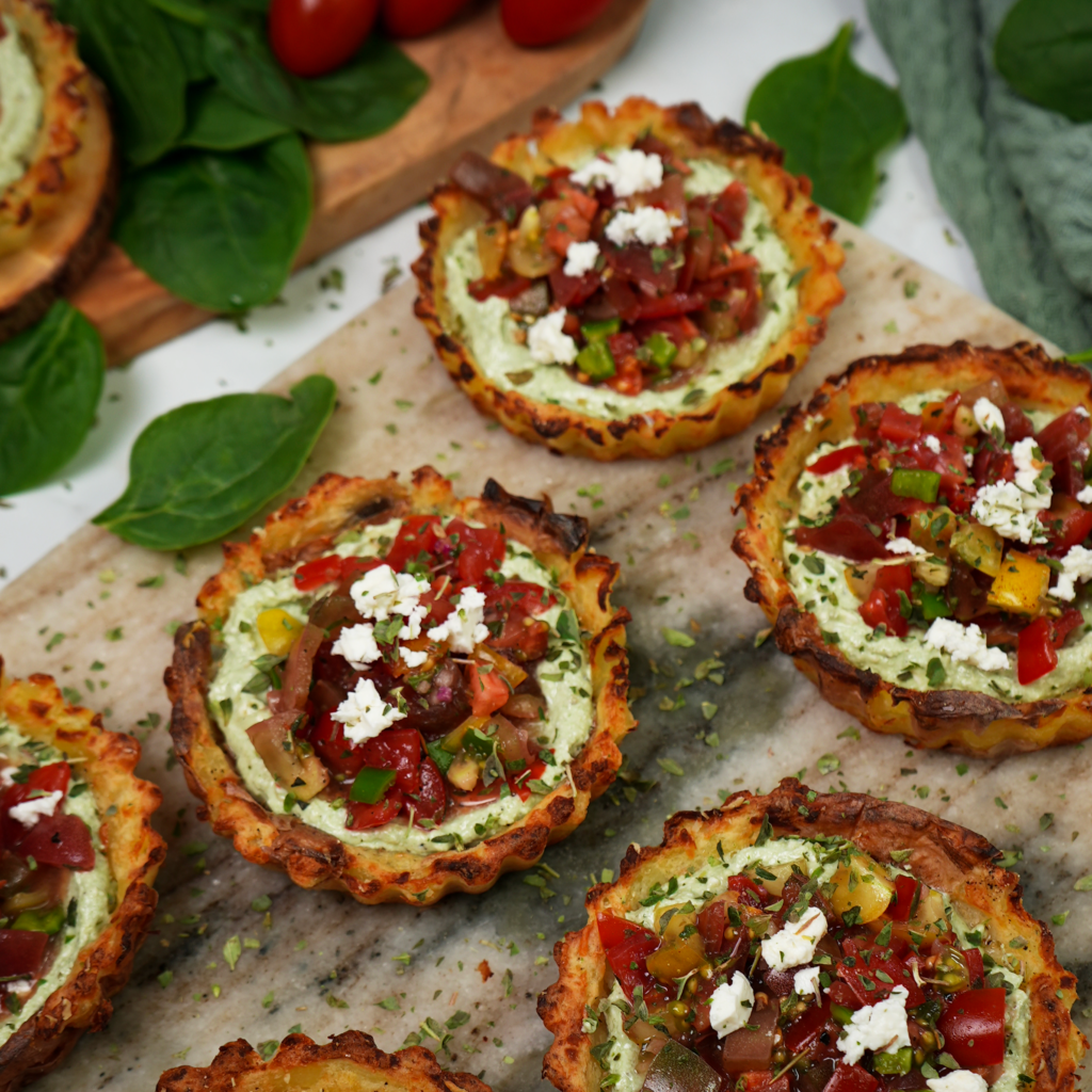 Mini Crushed Potato Tarts with spinach feta and tomato salsa.