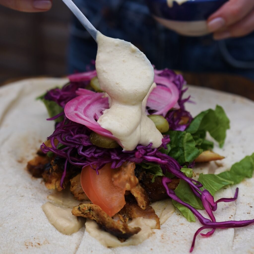 Assembling Chicken Shawarma.