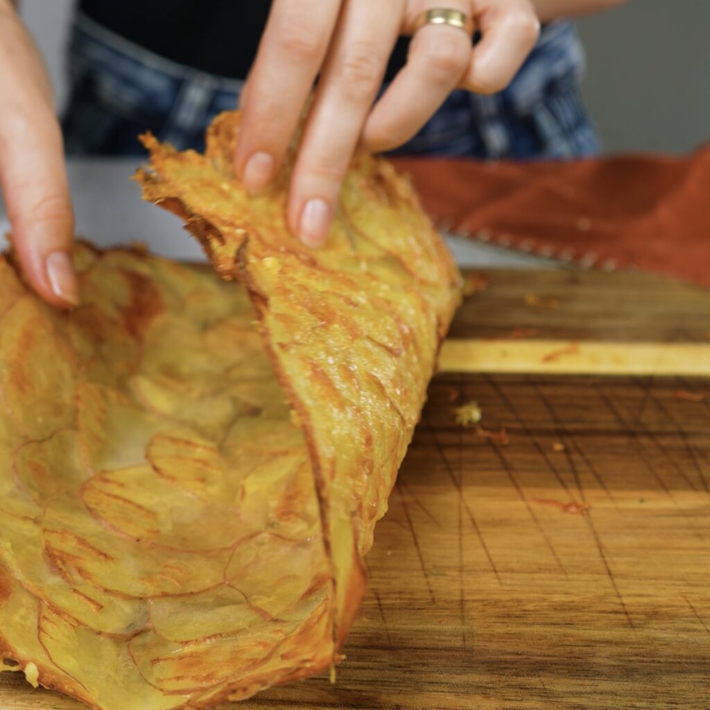 Golden, crispy potato crust for a gluten-free wrap, ready to be filled with shawarma.