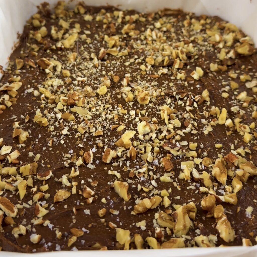 Fudgy Brownie batter in a baking dish, ready for baking