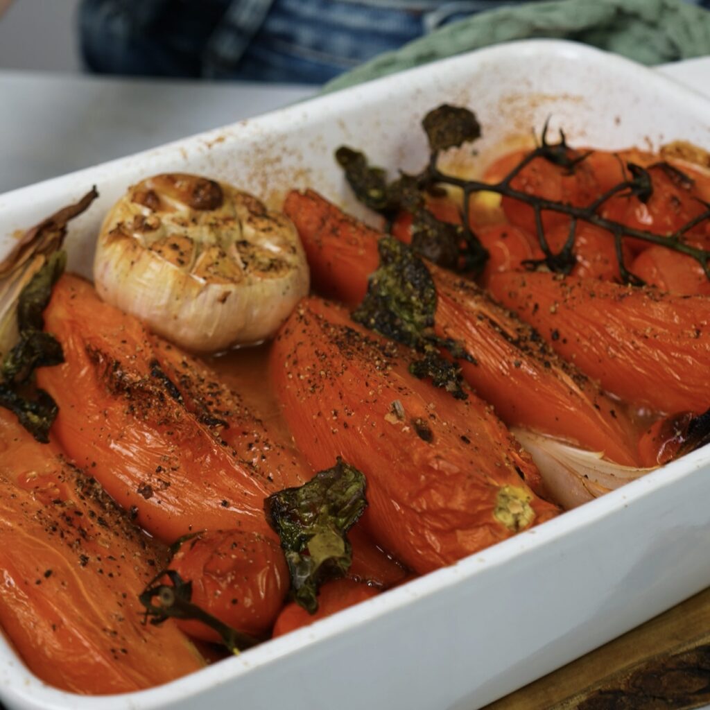 Roasted tomatoes, shallots, garlic, and basil fresh out of the oven