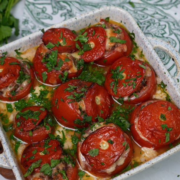 Stuffed tomatoes baked in béchamel sauce.