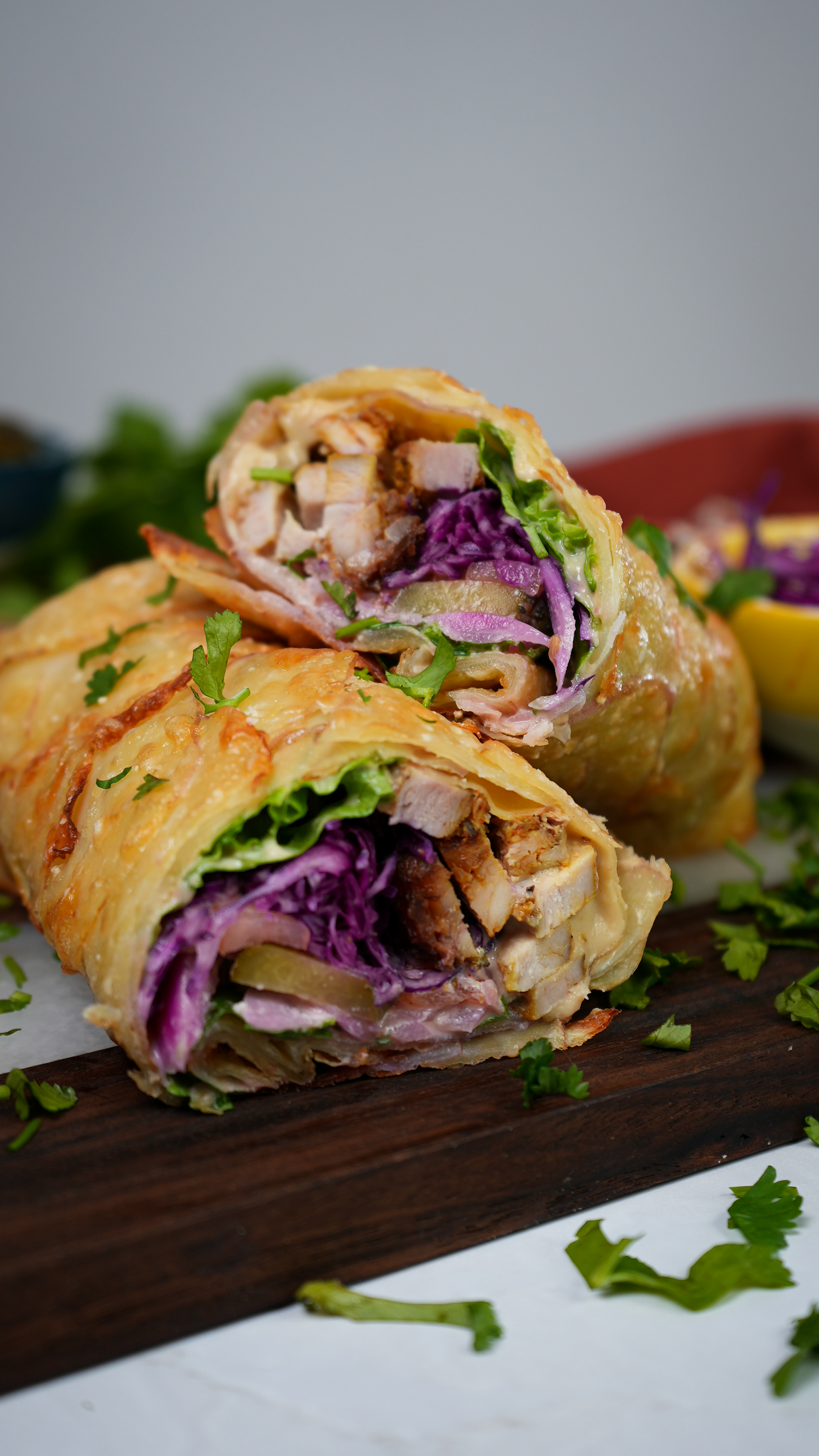 Gluten-free Potato Wrap Shawarma with a crispy Parmesan crust, filled with chicken shawarma, fresh vegetables, and hummus.