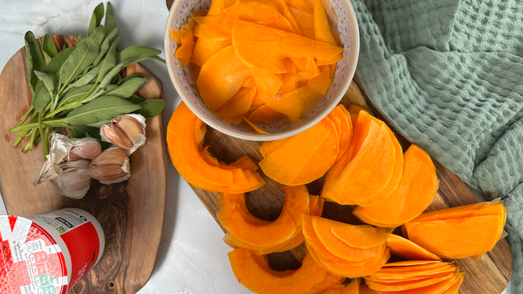 Freshly sliced butternut squash, showcasing vibrant orange flesh