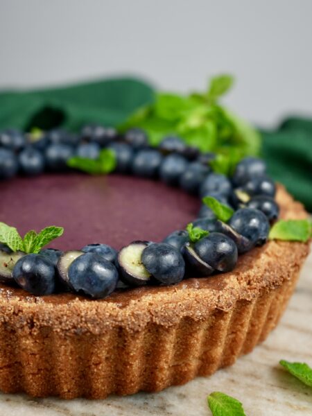 Berry Semolina Tart with blueberries and mint.