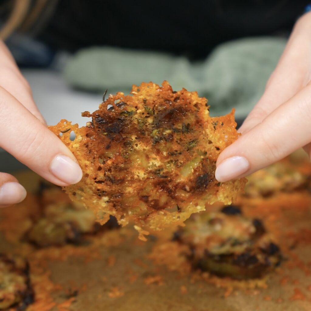 Baked smashed Brussels sprouts with a golden, crispy Parmesan crust.