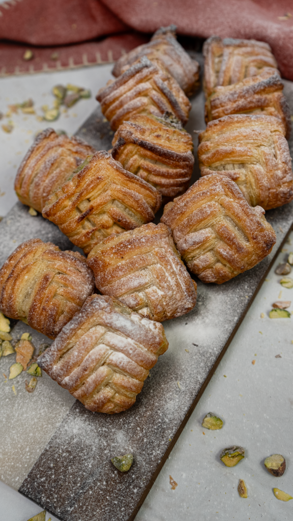 Baked Pistachio Puffs with a golden, flaky finish.