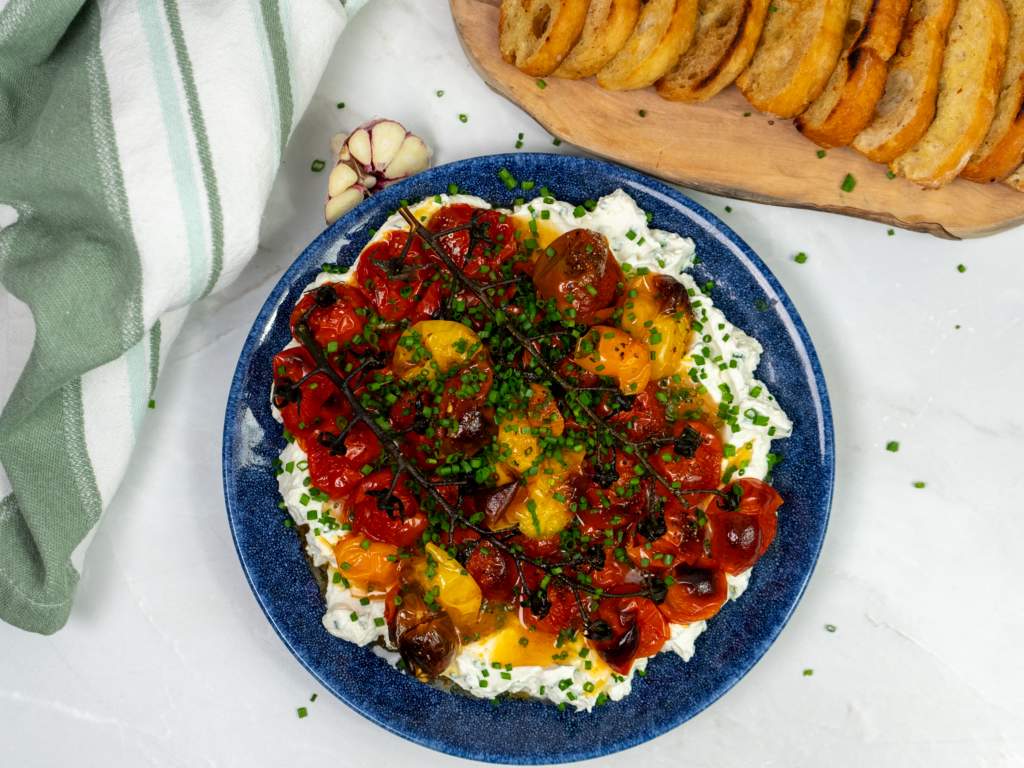 Roasted Tomato and Garlic Labneh Dip served with toasted bread.