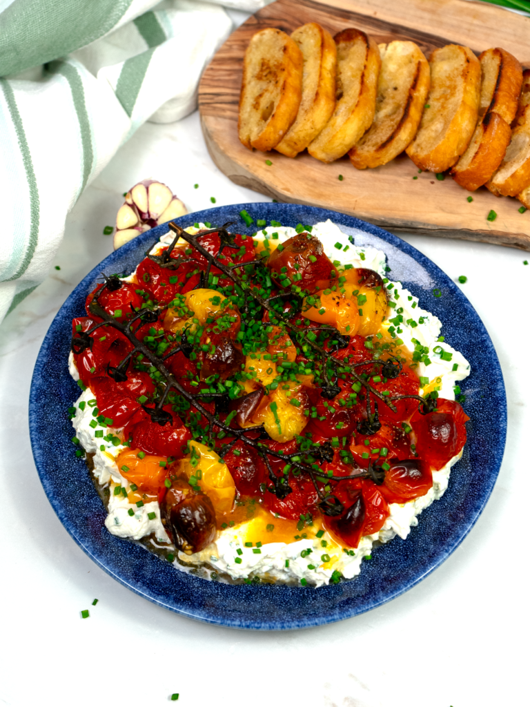 Roasted Tomato and Garlic Labneh Dip served with toasted bread.