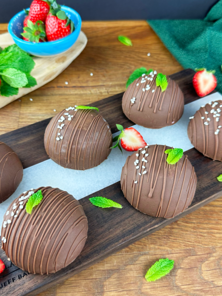 Frozen Strawberry Yogurt Gems with a chocolate shell.