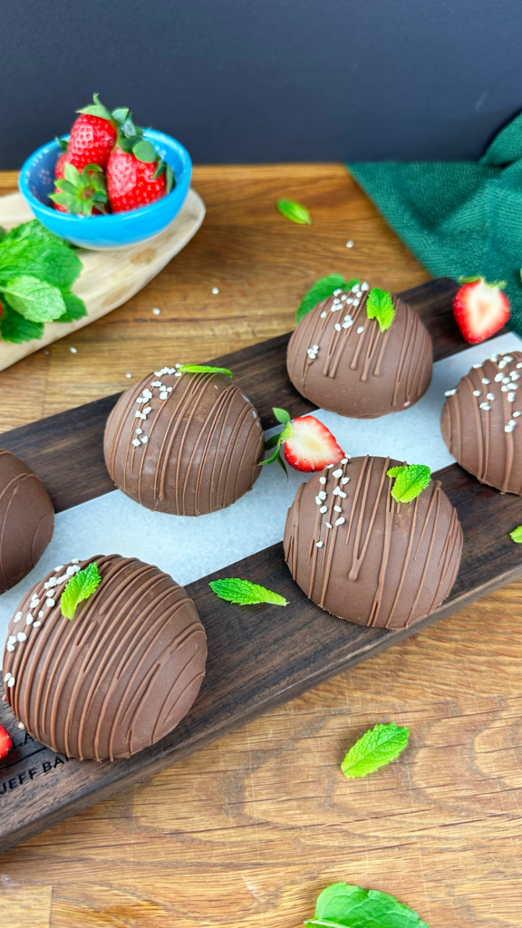 Frozen Strawberry Yogurt Gems with a chocolate shell.