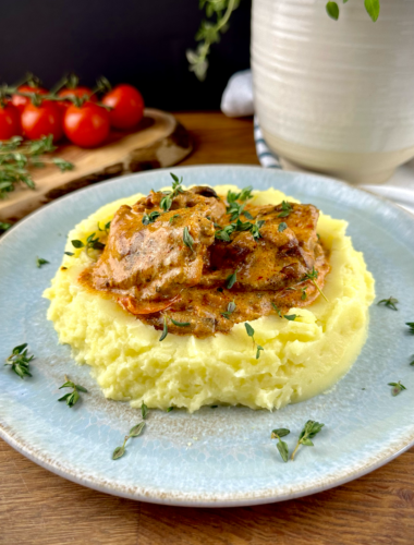 Creamy mushroom chicken served over mashed potatoes.