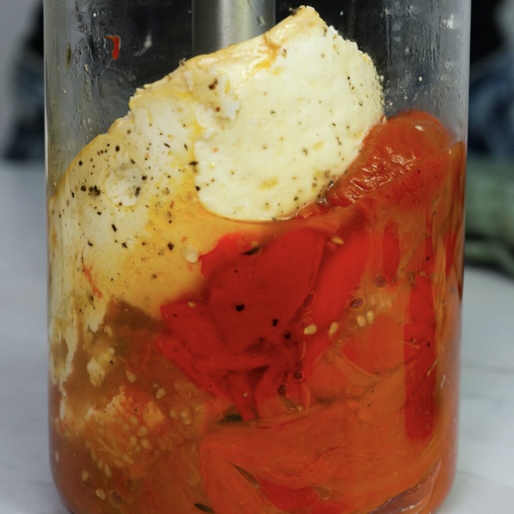 Blending roasted pepper and ricotta sauce.