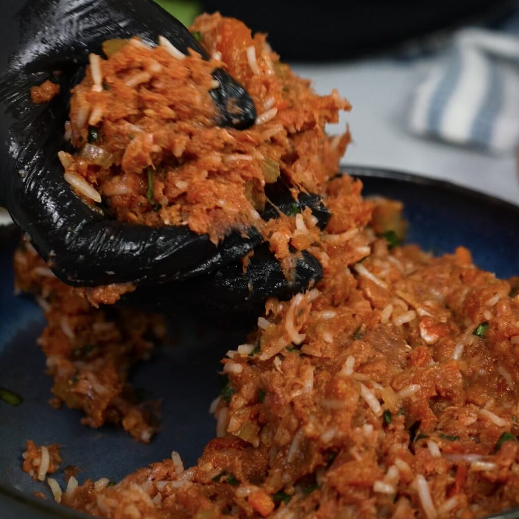 Mixing beef and rice filling