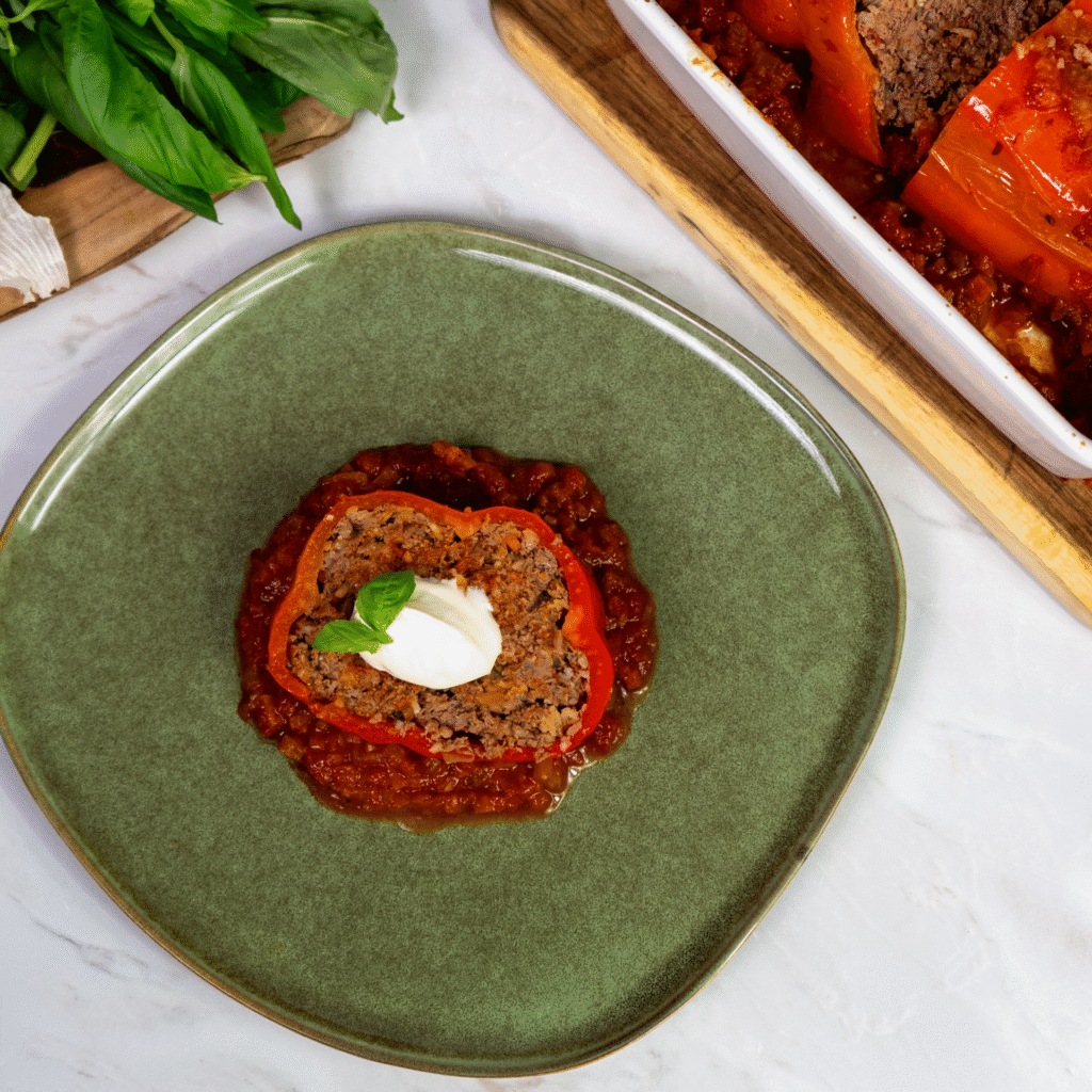 Stuffed giant pepper with slice on a plate