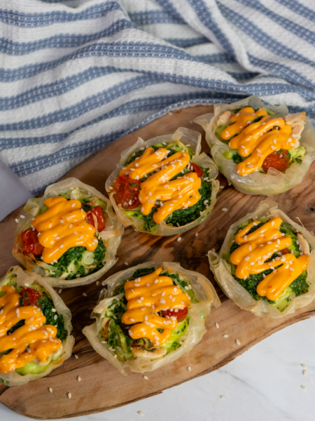 Ready mini rice paper quiches served on a plate