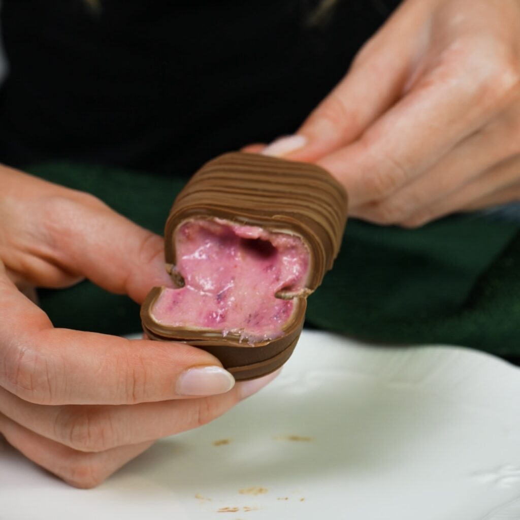Cherry cottage cheese ice cream cut in half