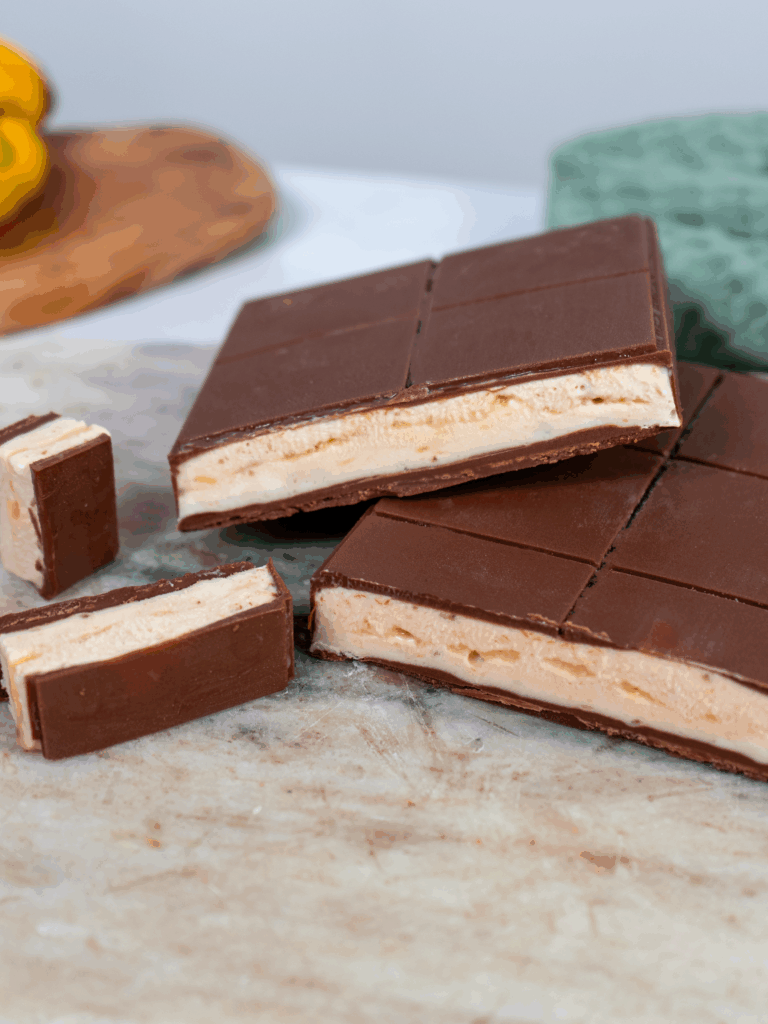 Sliced Easy Banana Ice Cream Bar with lime curd and chocolate shell