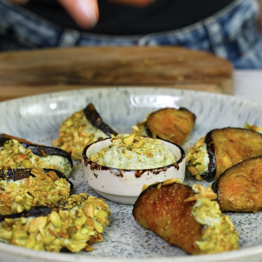 Aubergine cottage cheese tacos served on a platter