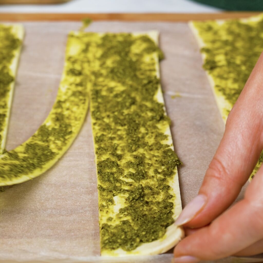 Puff pastry strip cut lengthwise, ready to twist.