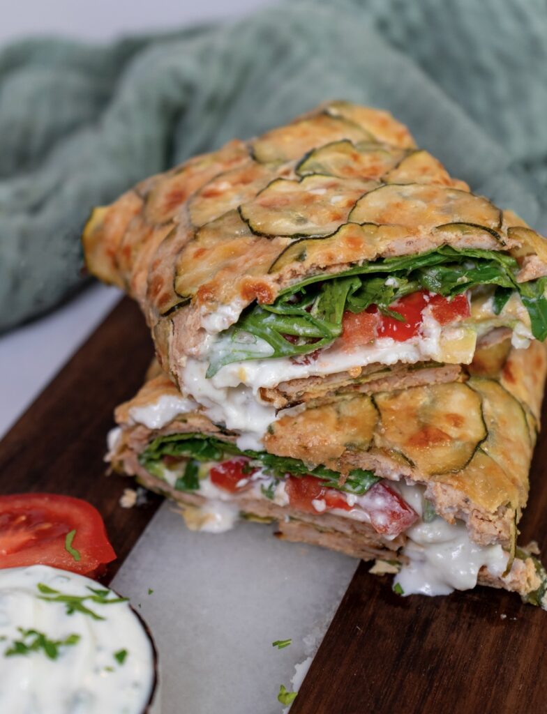High Protein Chicken Courgette Wrap served on a board