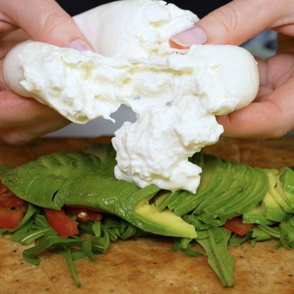 Filling added to the chicken courgette wrap base