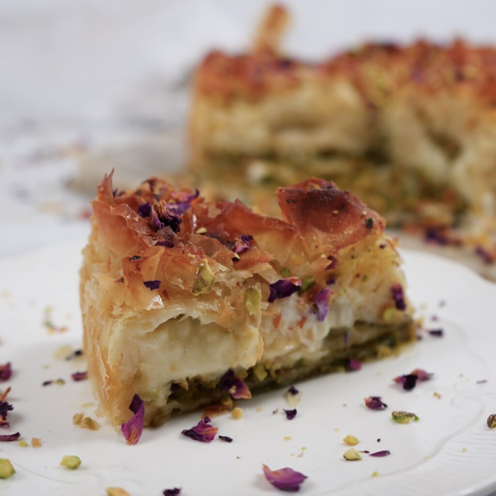Slice of baklava cake served on a plate