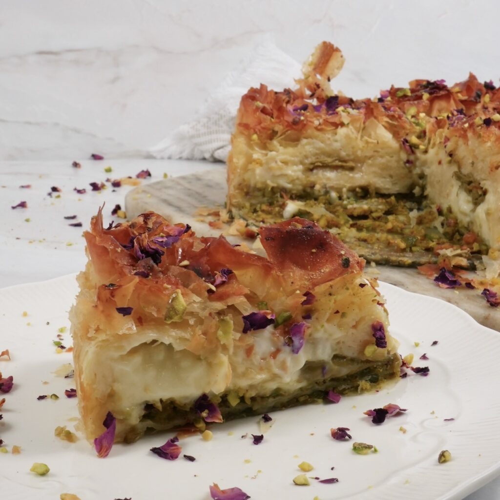 Slice of baklava cake served on a plate