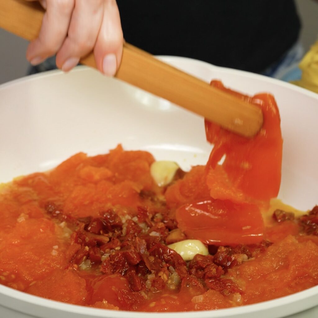 Removing tomato skins from the sauce