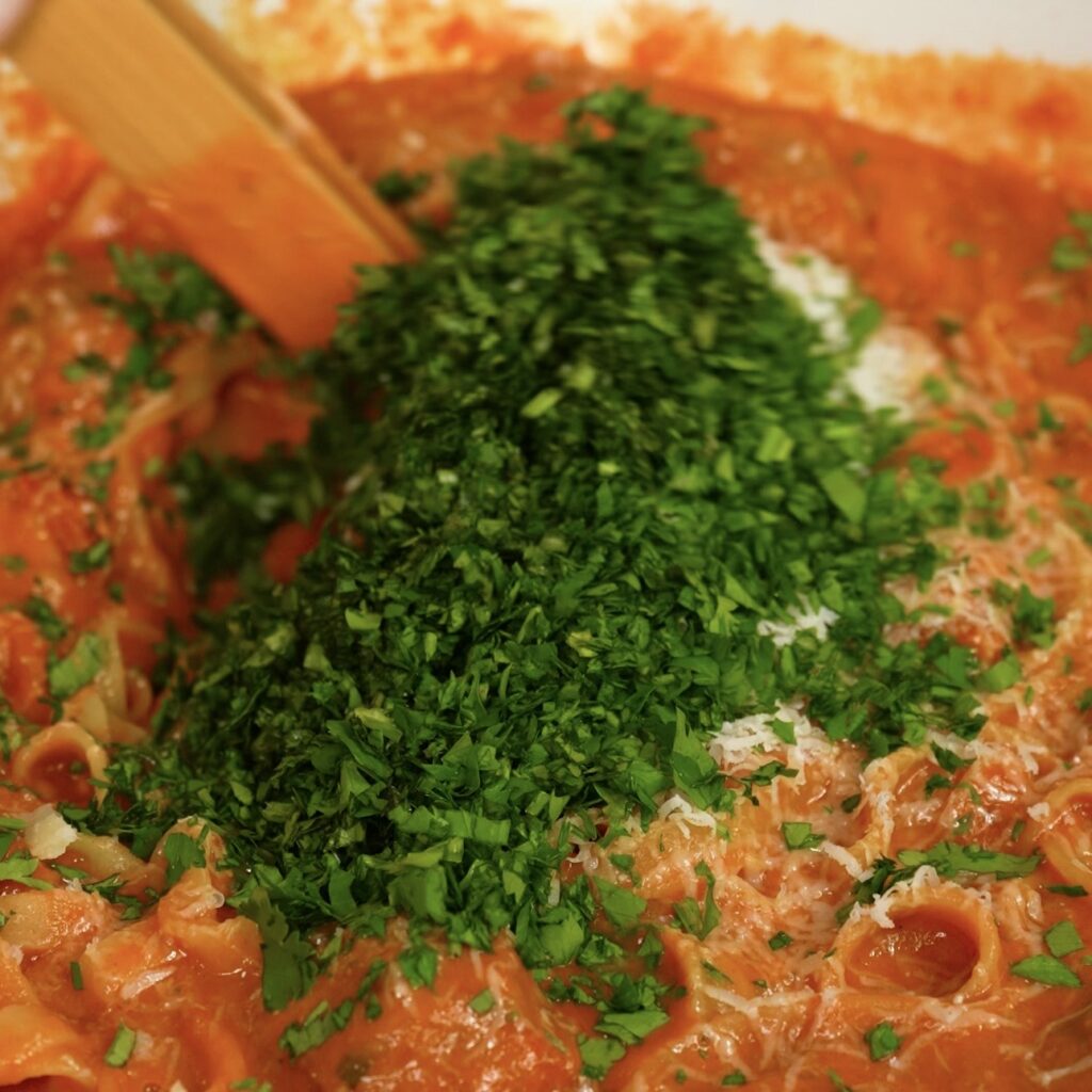 Parmesan and parsley added to One-Pan Tomato Meatball Pasta