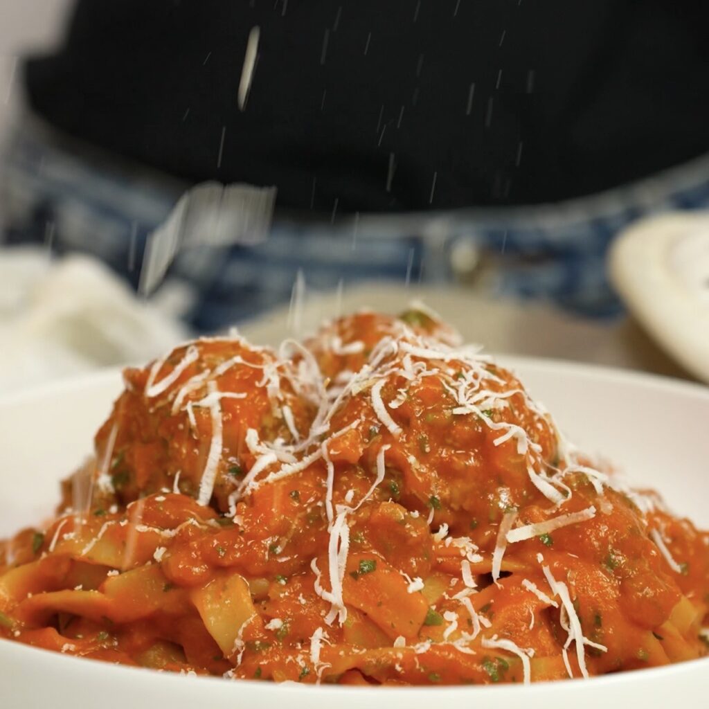 One-pan tomato meatball pasta on a plate