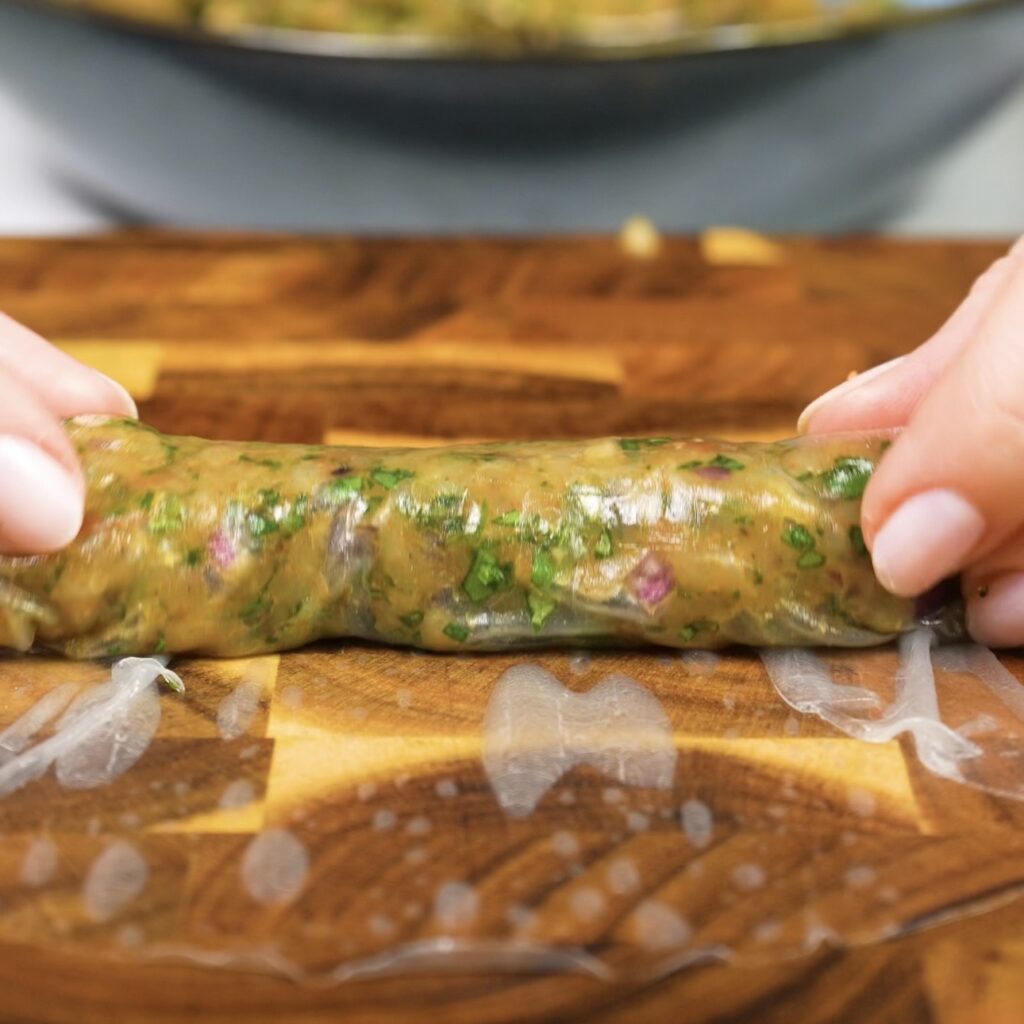 Rolling rice paper chicken sausage roll