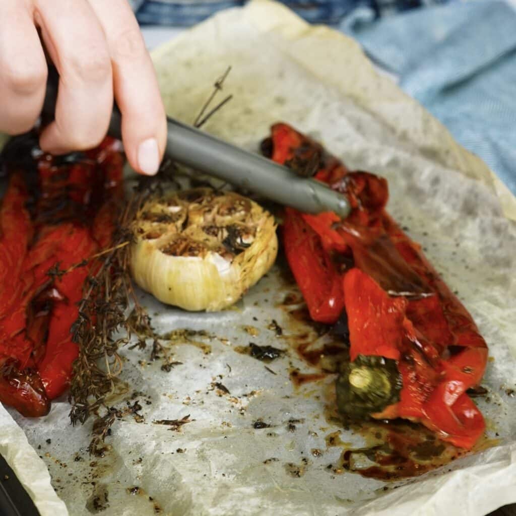 Removing the skin from roasted red peppers