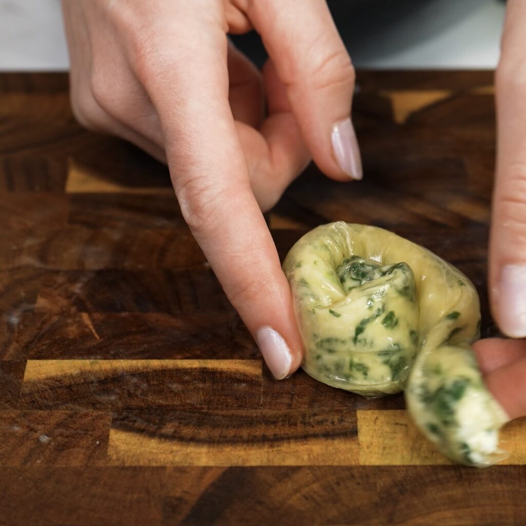 Rice paper roll shaped into a spiral before cooking