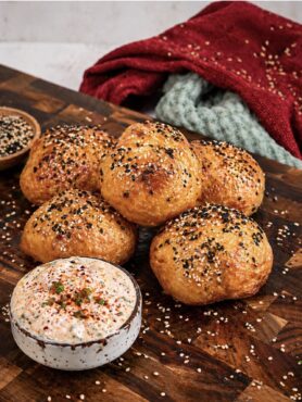 Crispy Air Fryer Rice Paper Cheese Balls served on a wooden board