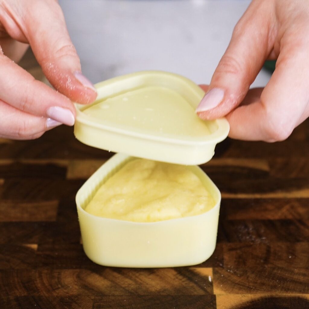 Using an onigiri mould to shape potato triangles
