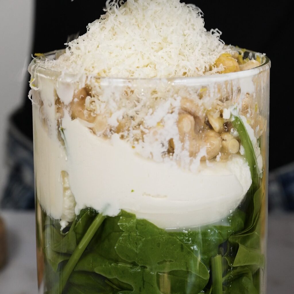 Spinach, ricotta, garlic, soaked cashews, lemon zest, lemon juice, and Parmesan ready before blending