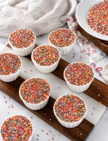 Banana Dot Cakes arranged on a wooden board.