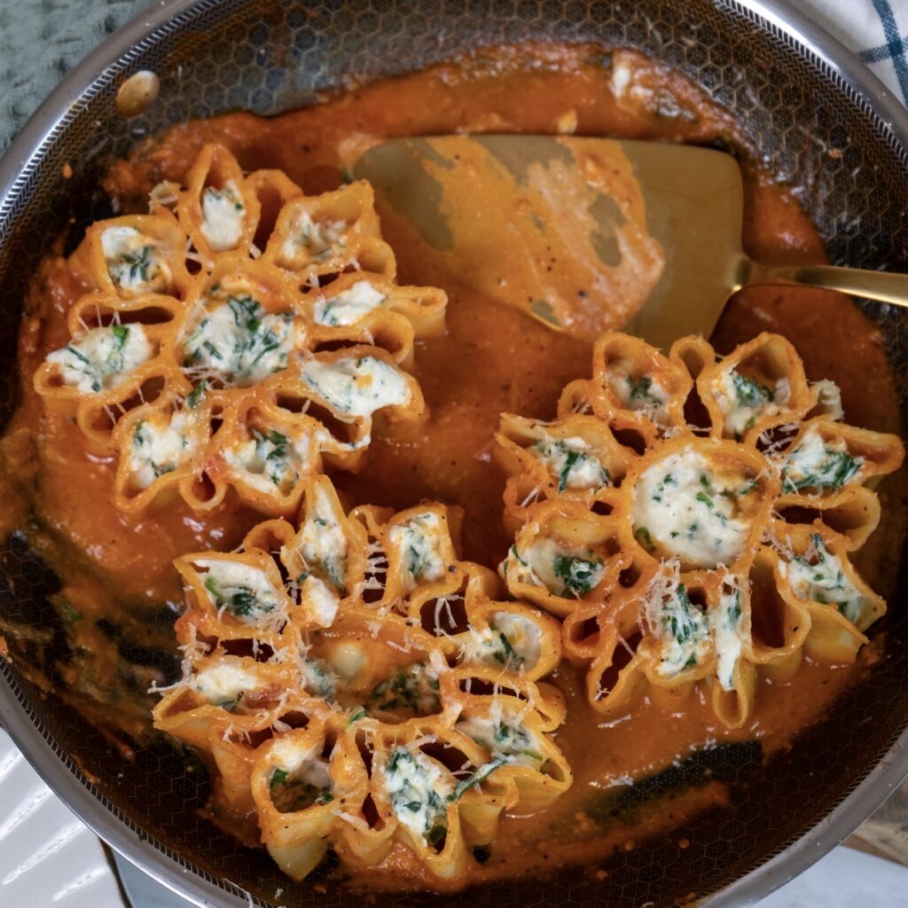 Three cooked I Soli di Capri pasta pieces remaining in the pan