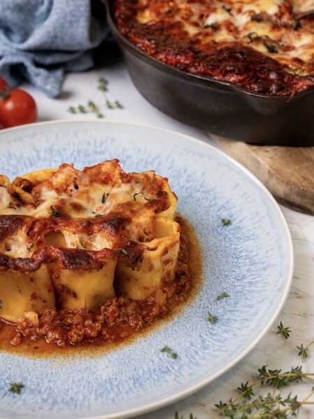 Mozzarella-Stuffed Paccheri served on a plate.