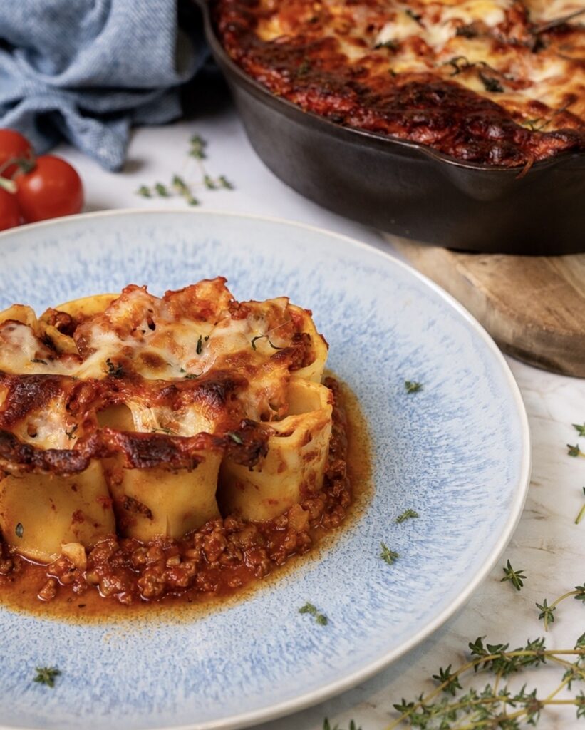 Mozzarella-Stuffed Paccheri served on a plate.