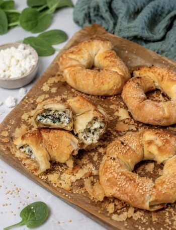 Feta and Spinach Filo Doughnuts served on a wooden board