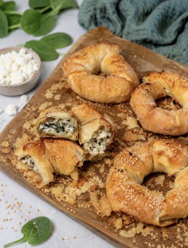 Feta and Spinach Filo Doughnuts served on a wooden board